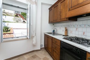 Fridge, oven, dishwasher, dining tables