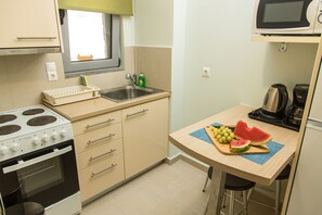 Fridge, microwave, oven, stovetop - One Bedroom Apartment with a breezy Sea-View balcony. Breakfast included. (Lefkada)