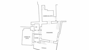 Plano de planta con habitaciones identificadas: Camera da Letto, WC, Cucina, Soggiorno y Terrazzo.