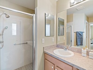 Combined shower/tub, hair dryer, towels, soap