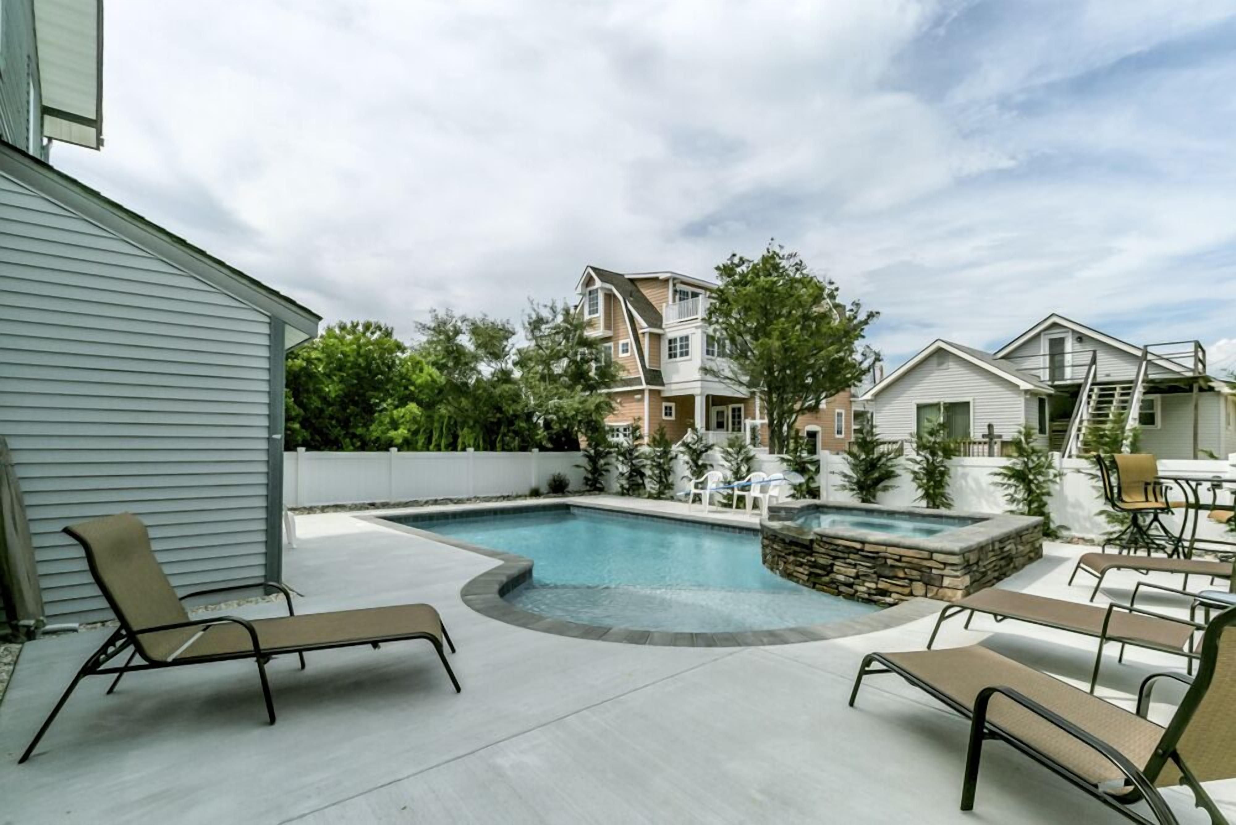 NEW HEATED SWIMMING POOL!!, BEACH BLOCK home, with ocean views & short walk to restaurant's,