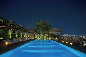 Outdoor pool, pool cabanas (surcharge), pool umbrellas