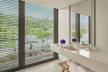 Designer toiletries, hair dryer, bathrobes, slippers at The West Hollywood EDITION