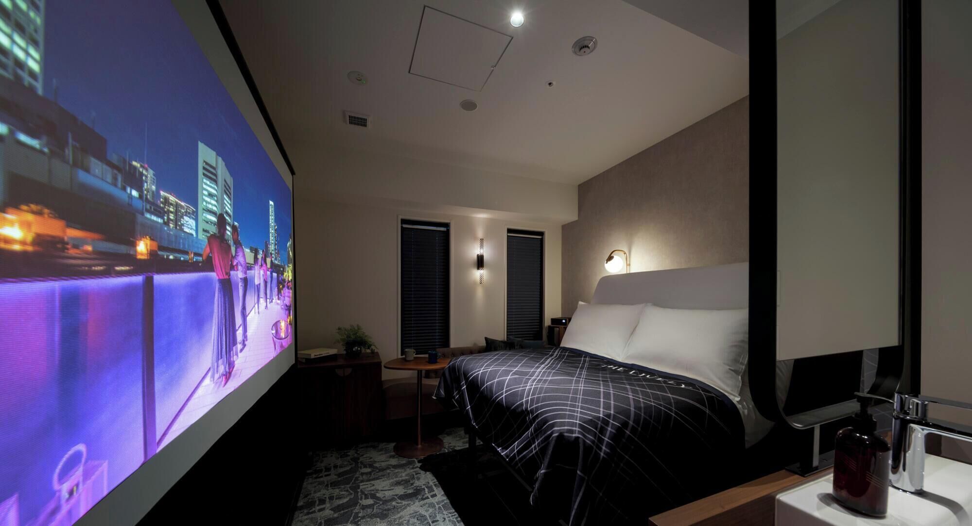 Superior Single Room (Theatre Room with Projector) | Premium bedding, blackout drapes, soundproofing, free WiFi