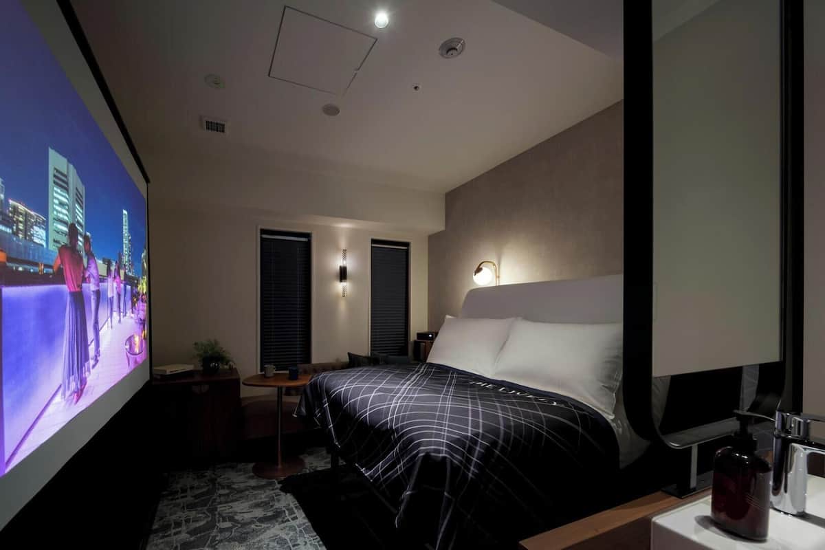 Superior Single Room (Theatre Room with Projector) | Premium bedding, blackout drapes, soundproofing, free WiFi