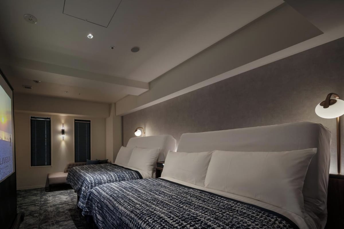 Superior-værelse med 2 enkeltsenge (Theatre Room with Projector) | Premium-sengetøj, mørklægningsgardiner, lydisolering, gratis Wi-Fi