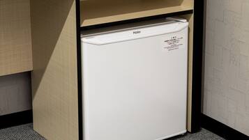 A compact, white refrigerator with a label indicating it is ENERGY STAR certified.