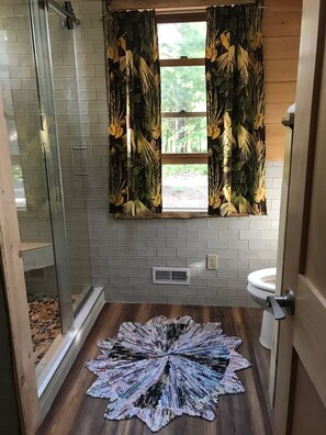 Bathtub, hair dryer, towels, soap