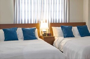 3 bedrooms, premium bedding, in-room safe, desk