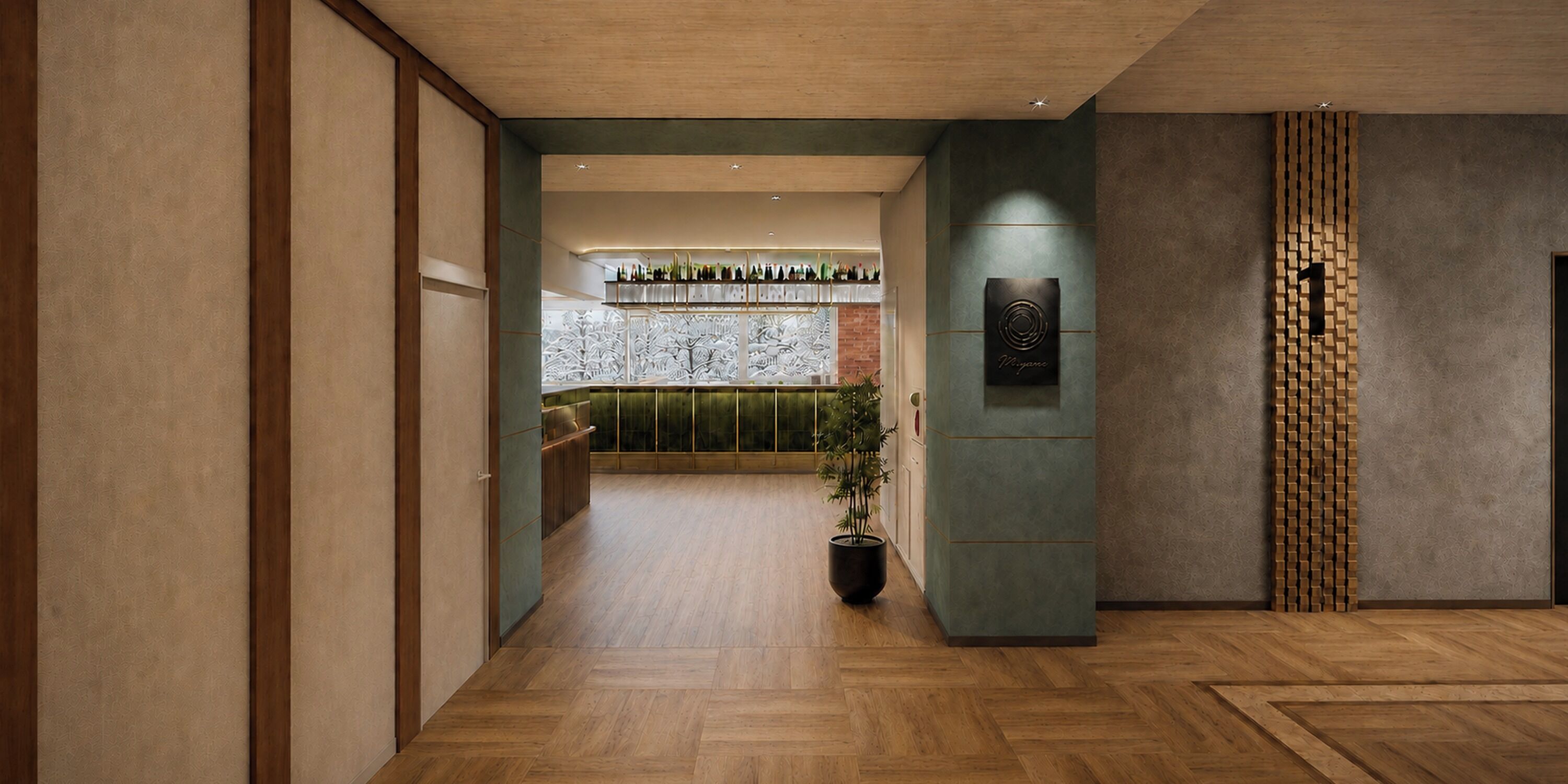 Un interior moderno con suelo de madera, una zona de bar con botellas y una planta.