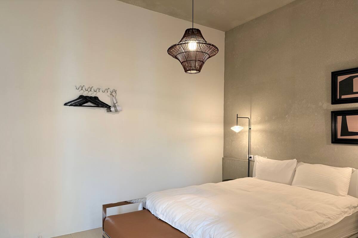 Premium bedding, down duvets, soundproofing, free WiFi