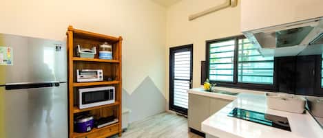 Basic Quadruple Room, City View | Living area | Flat-screen TV