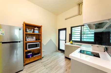 Basic Quadruple Room, City View | Living area | Flat-screen TV