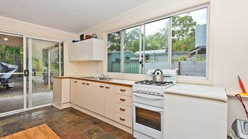 House, 2 Bedrooms | Private kitchen | Full-size fridge, oven, stovetop, cookware/dishes/utensils