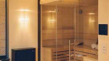 Deluxe Suite, 1 King Bed, Sauna | Bathroom | Eco-friendly toiletries, hair dryer, bathrobes, slippers