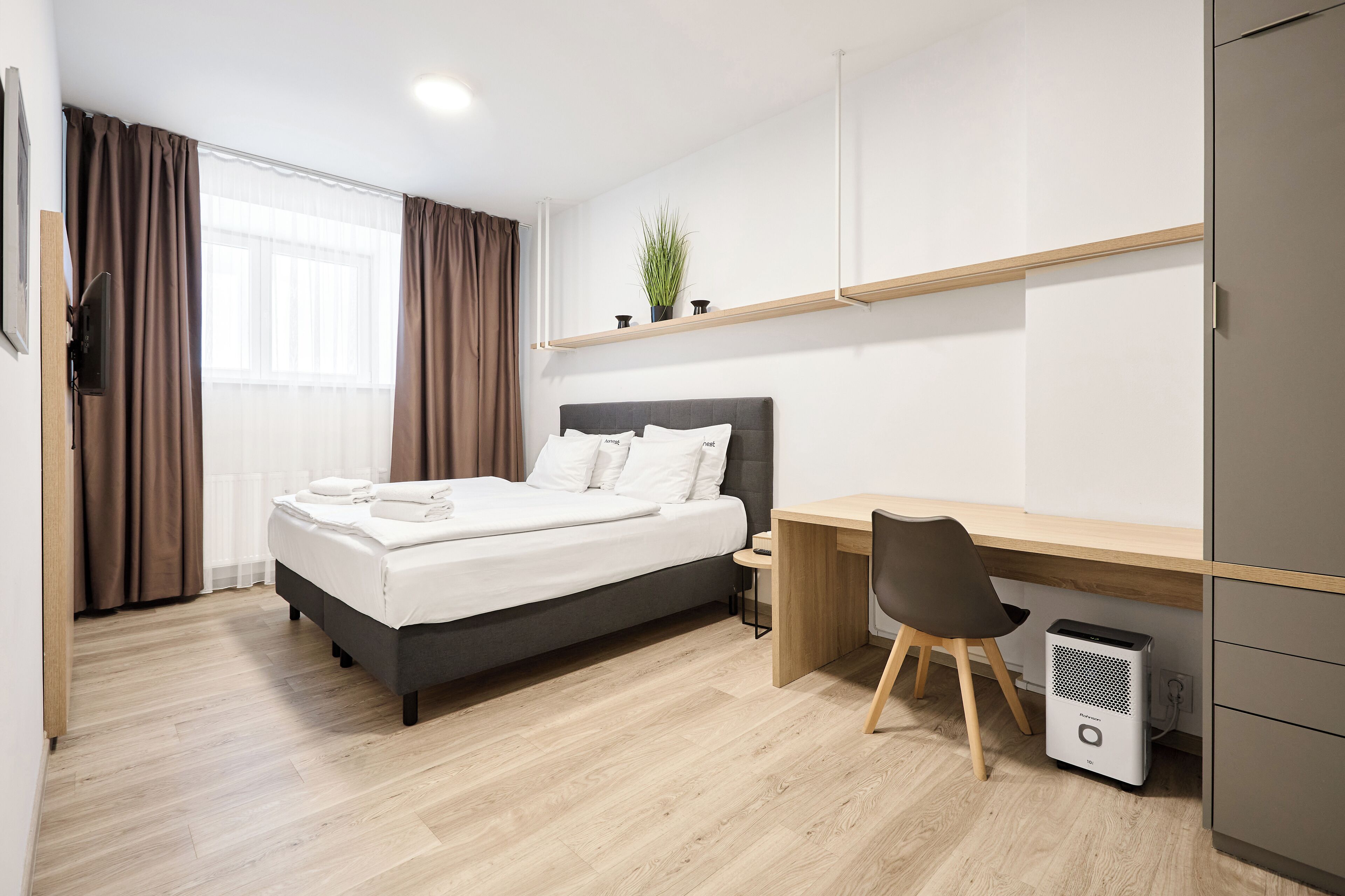 Apartment, Ground Floor | Desk, blackout drapes, iron/ironing board, free WiFi