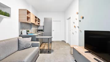 Junior appartement | Een bureau, verduisterende gordijnen, een strijkplank/strijkijzer