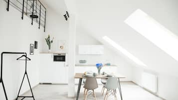 Loft Apartment | Desk, blackout drapes, iron/ironing board, free WiFi