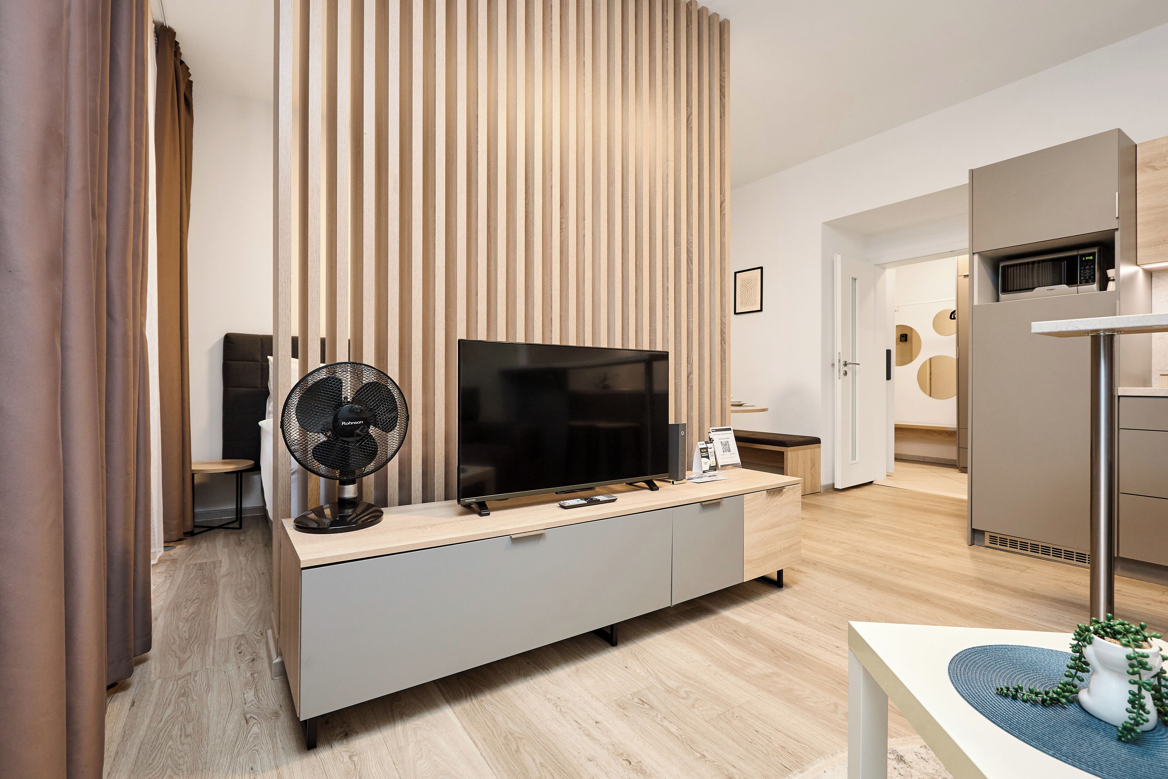 Estudio clásico | Área de sala de estar | Televisión de pantalla plana 