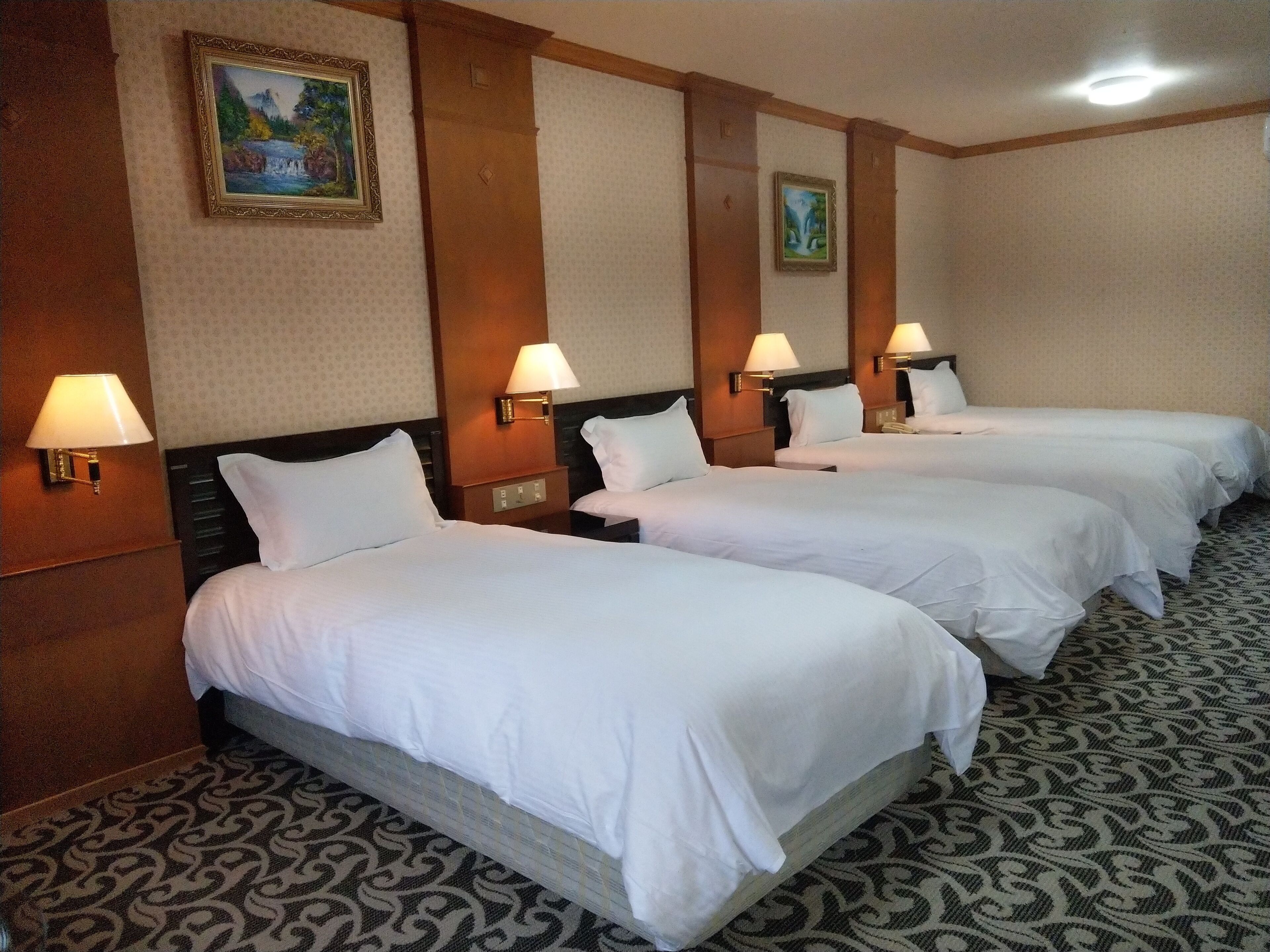 deluxe quadruple room | desk, blackout curtains, free wifi, bed sheets