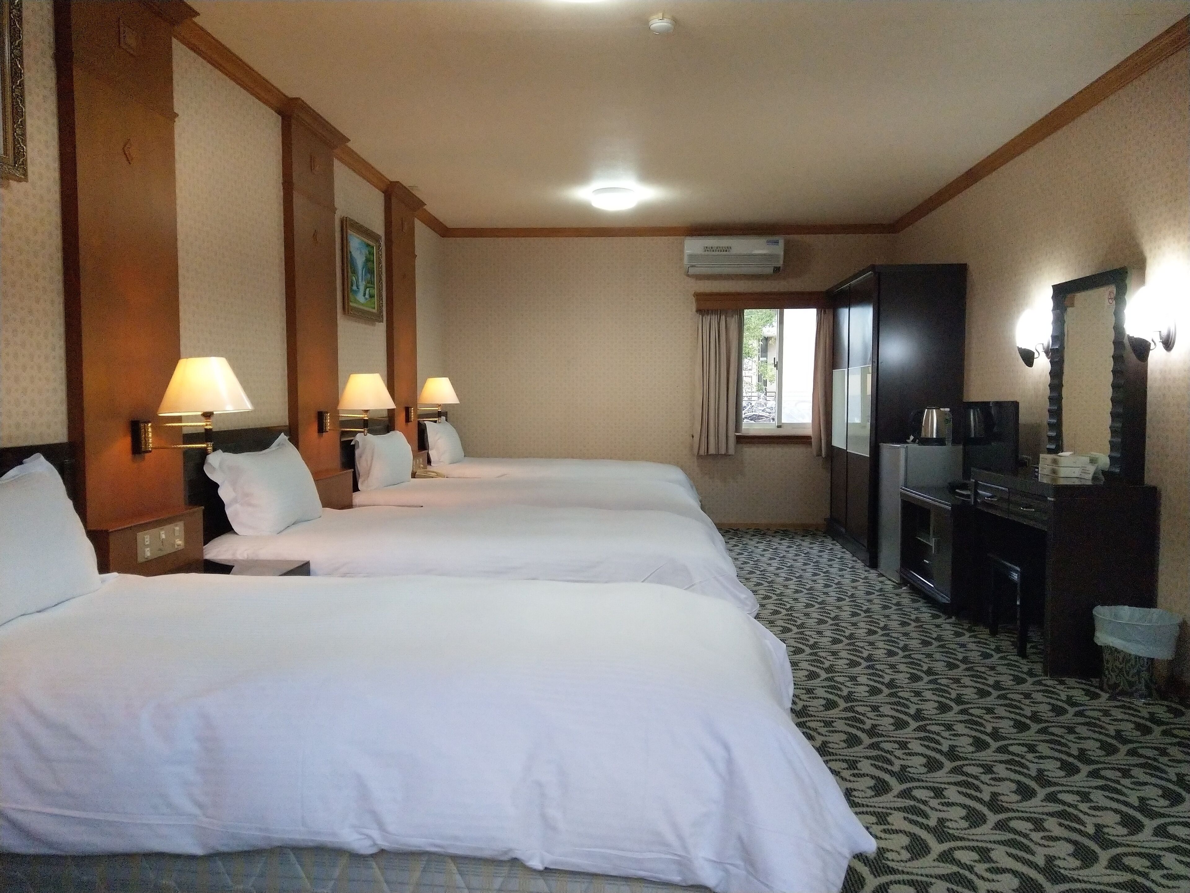 deluxe quadruple room | desk, blackout curtains, free wifi, bed sheets