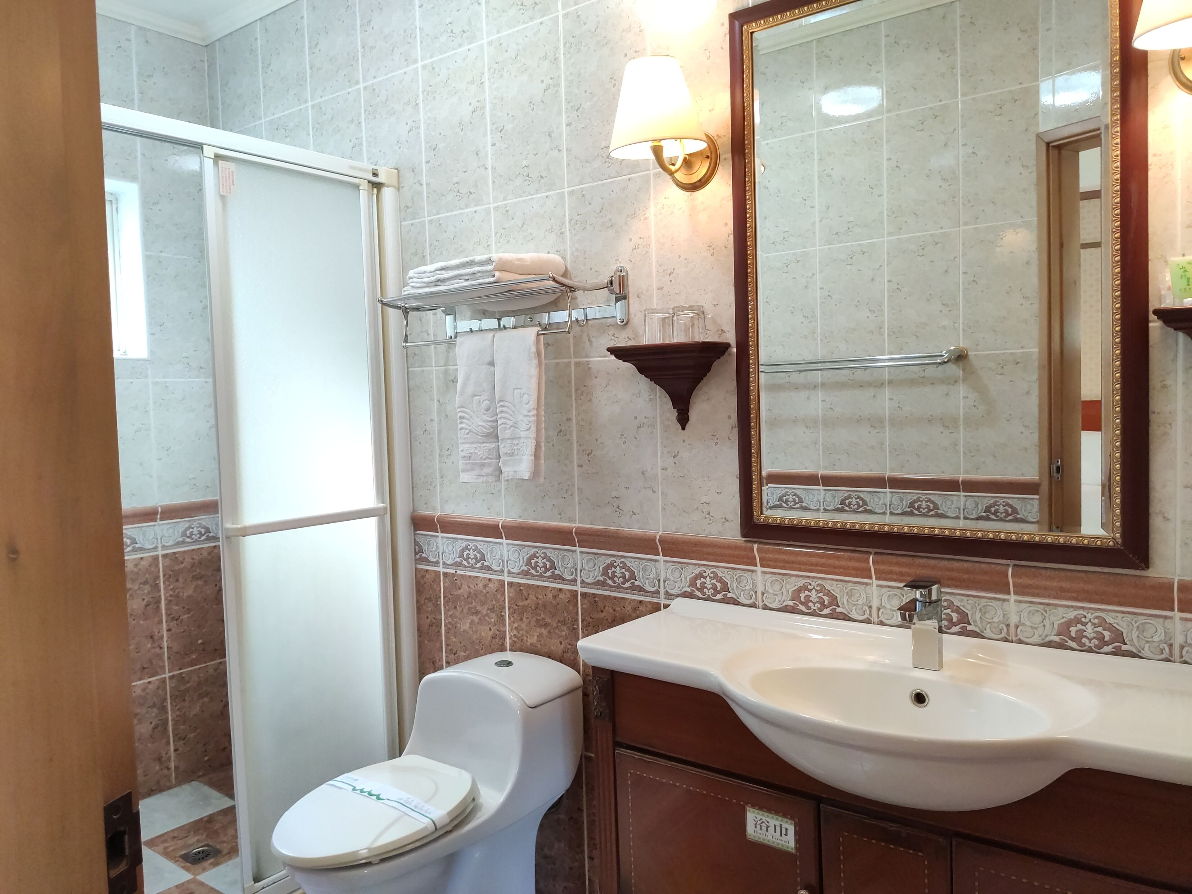 family triple room | bathroom | shower, rainfall showerhead, free toiletries, hair dryer