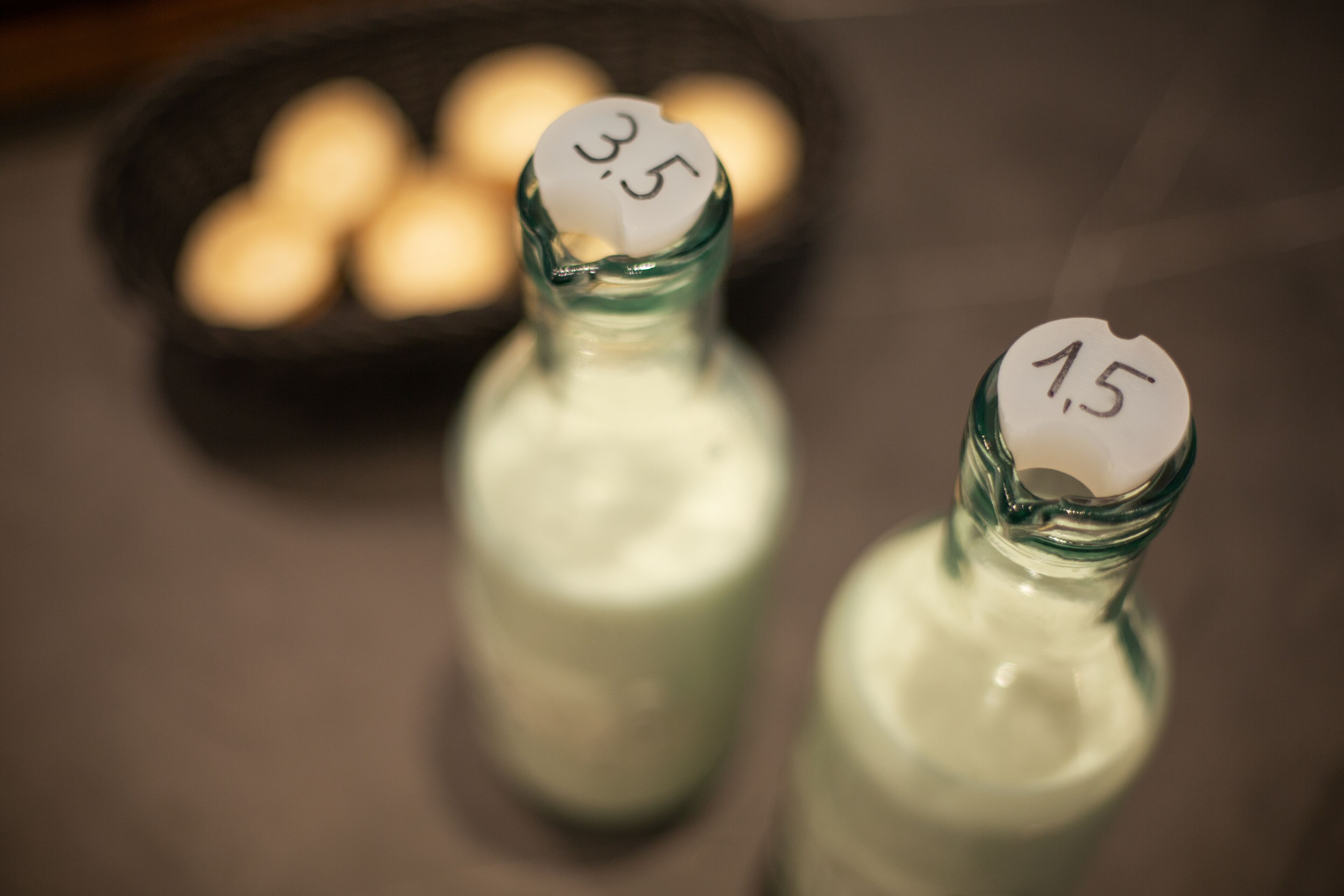 Two bottles with price tags of 3.5 and 1.5.
