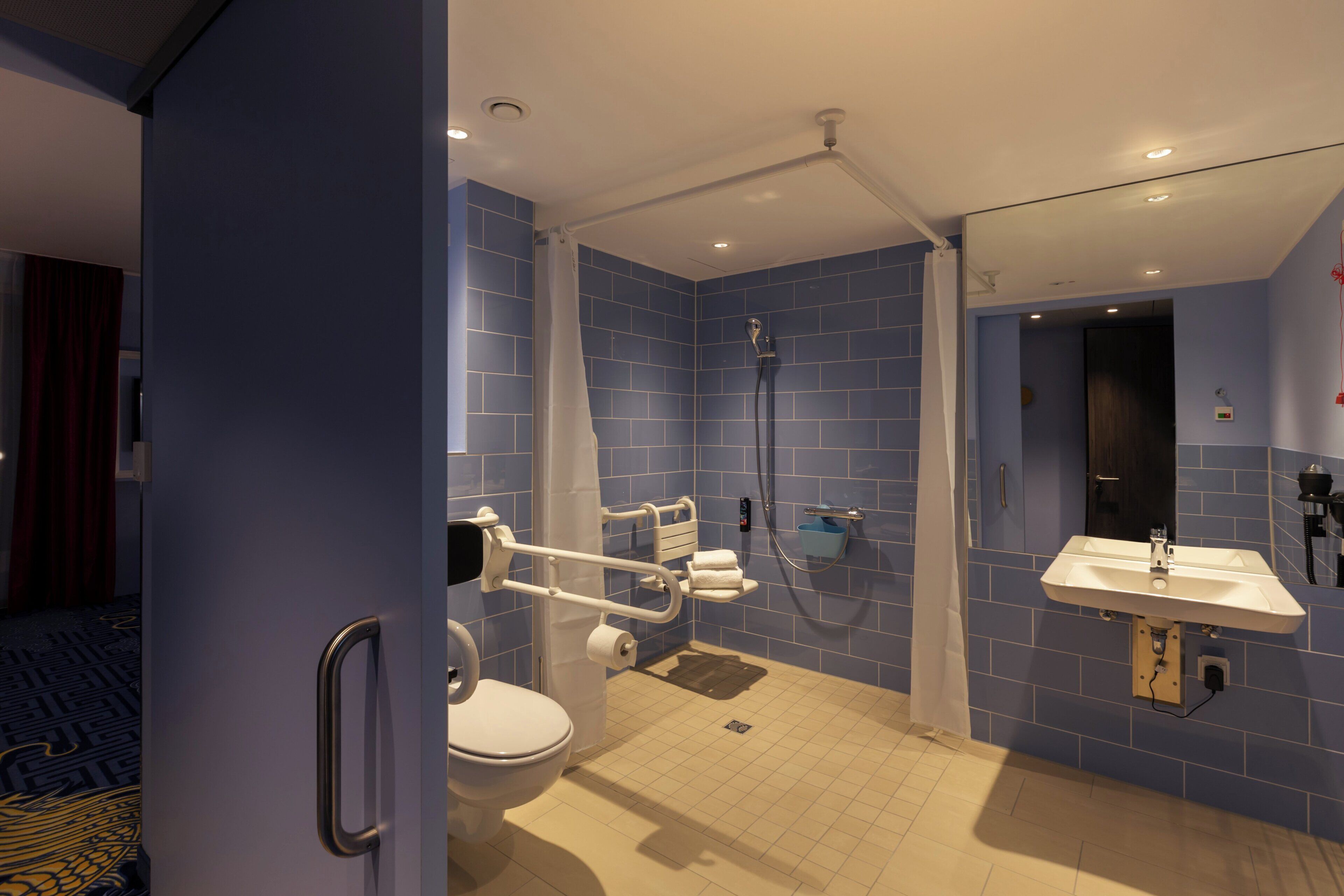 premium room, 1 queen bed, accessible, kitchenette | bathroom | shower, free toiletries, hair dryer, towels