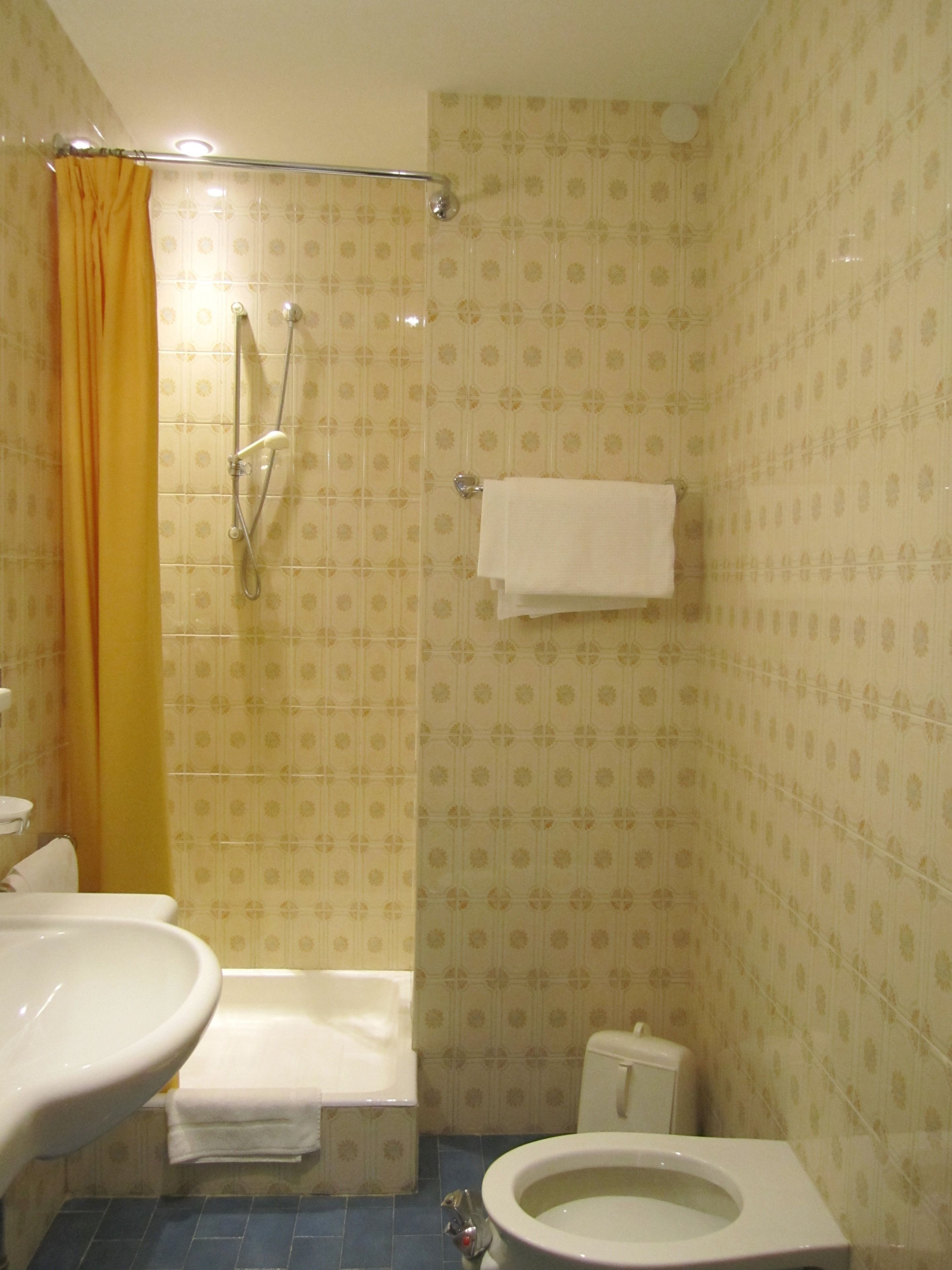 double room | bathroom | hair dryer, towels, soap, toilet paper