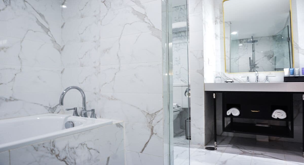 suite | bathroom | bathrobes, slippers, towels, soap