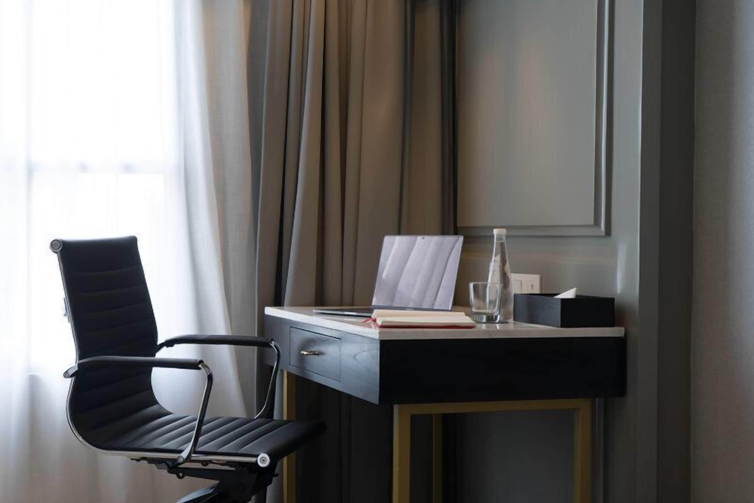 premium bedding, free minibar, in-room safe, blackout curtains