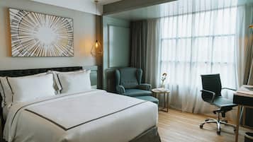 Ropa de cama de alta calidad y minibar con artículos gratuitos