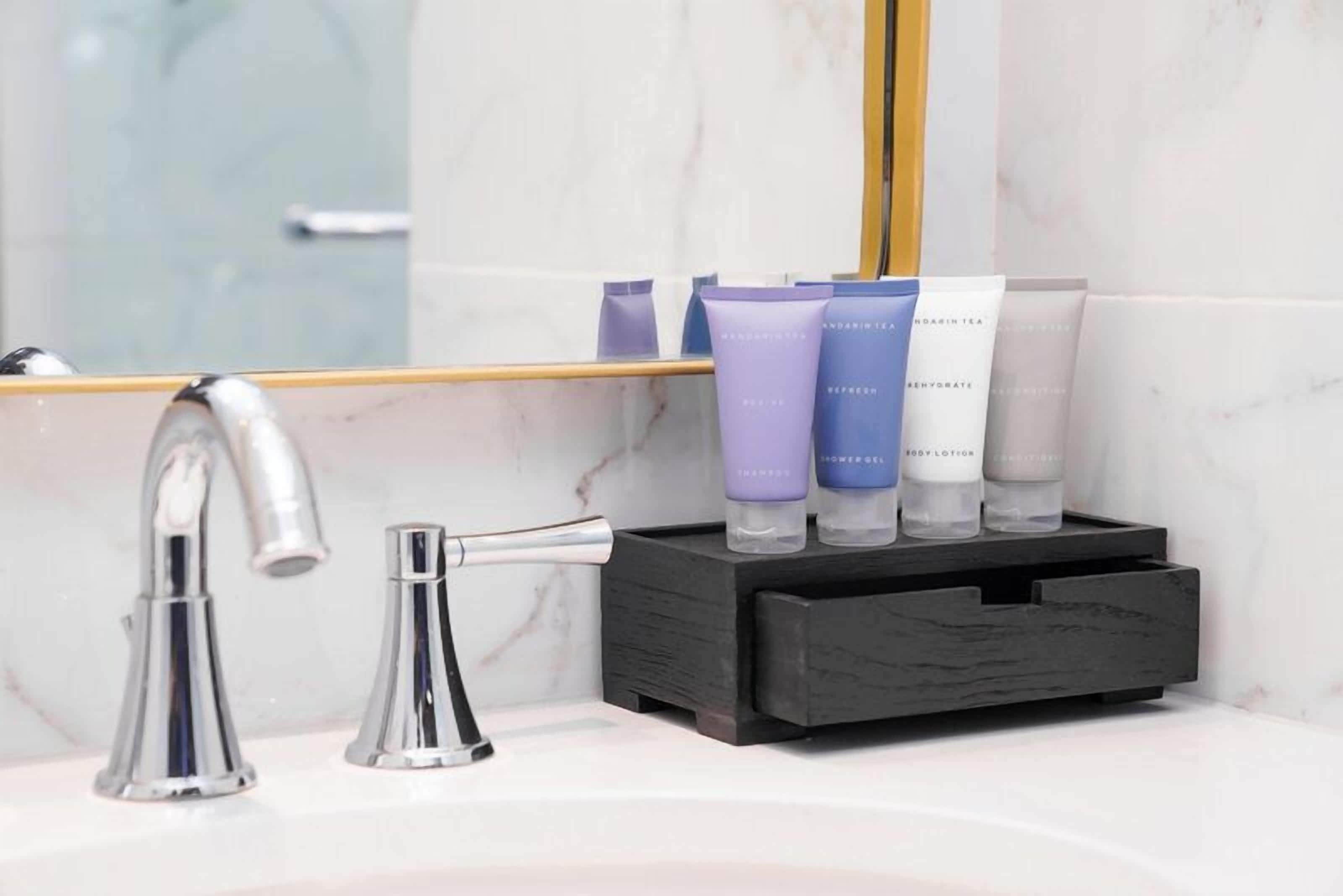 bathrobes, slippers, towels, soap