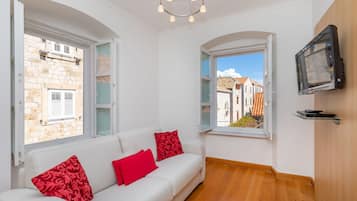 Standaard appartement | Woonruimte | Flatscreentelevisie