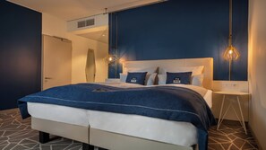 Premium bedding, in-room safe, blackout drapes, soundproofing
