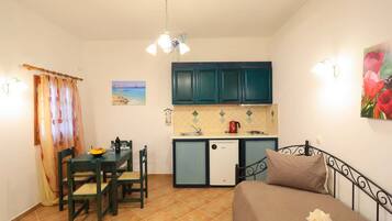 Studio Exclusive, quang cảnh biển (Stone) | Khu phòng khách | TV màn hình phẳng