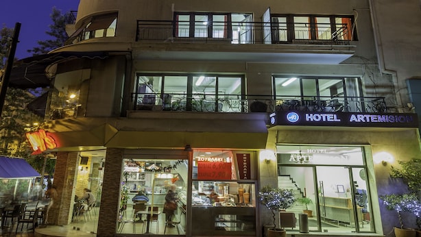 A multi-story hotel with a prominent sign for 'Hotel Artemision'. - Artemision (Athens)