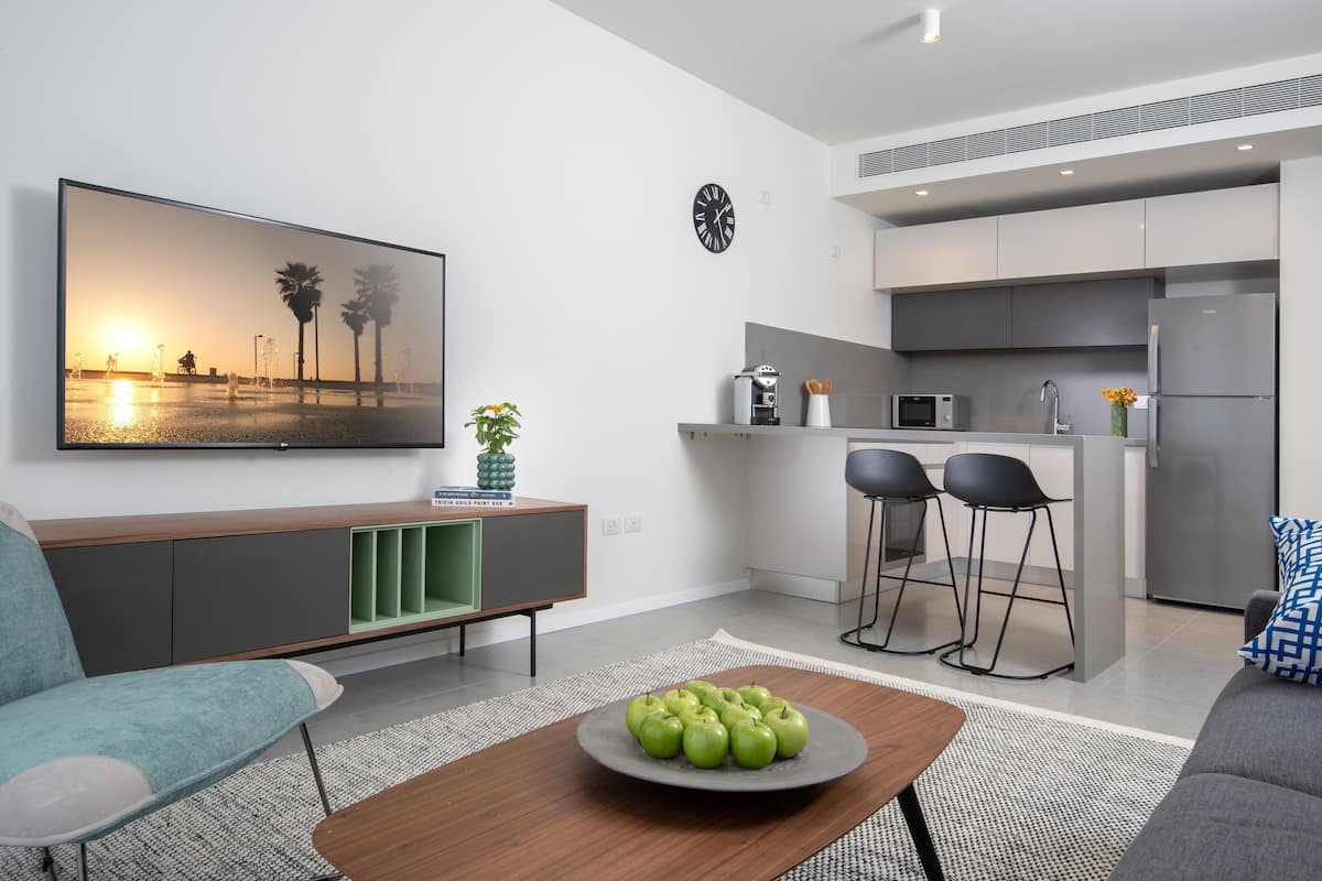 Apartment, 1 Bedroom | Living area | 43-inch Smart TV with satellite channels, TV