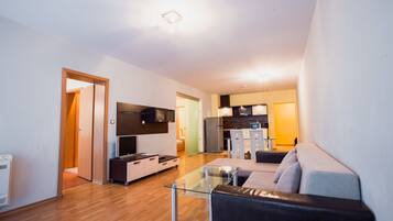 Comfort Apartment, 2 Bedrooms | Living area | Flat-screen TV, DVD player