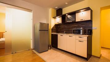 Comfort Apartment, 2 Bedrooms | Private kitchen | Fridge, microwave, electric kettle, cookware/dishes/utensils