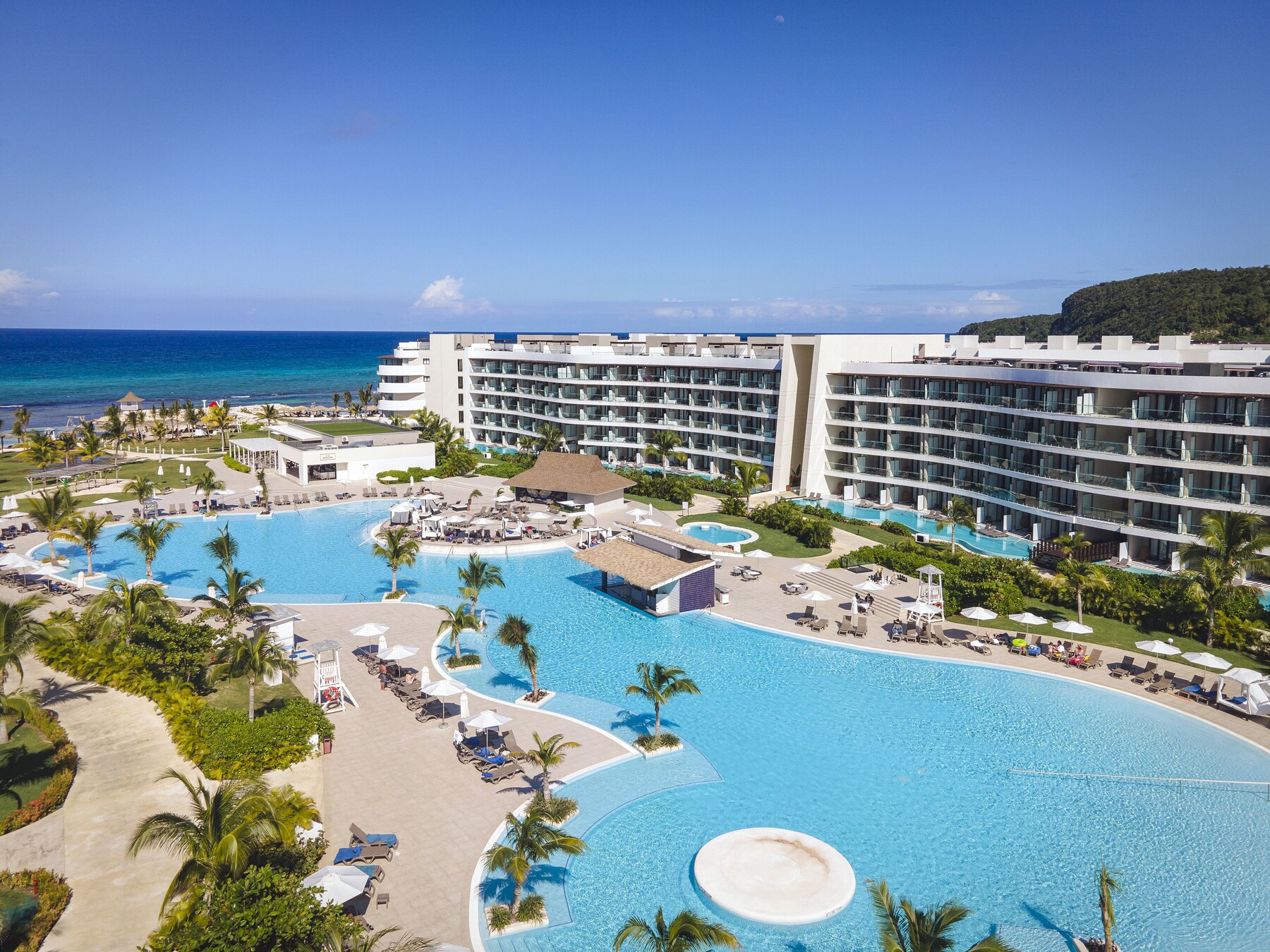 2 outdoor pools, open 8:00 AM to 6:00 PM, pool cabanas (surcharge)