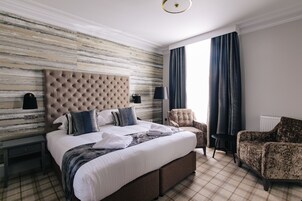 Premium bedding, in-room safe, individually decorated