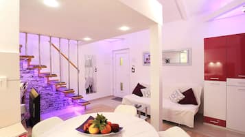 Lilla Apartment | Living room | Flat-screen TV, fireplace, DVD player, heated floors