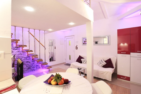 Lilla Apartment | Living room | Flat-screen TV, fireplace, DVD player, heated floors
