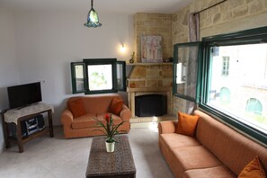 House, 2 Bedrooms, Mountain View | Living area | Flat-screen TV, fireplace - Local House (Apokoronas)