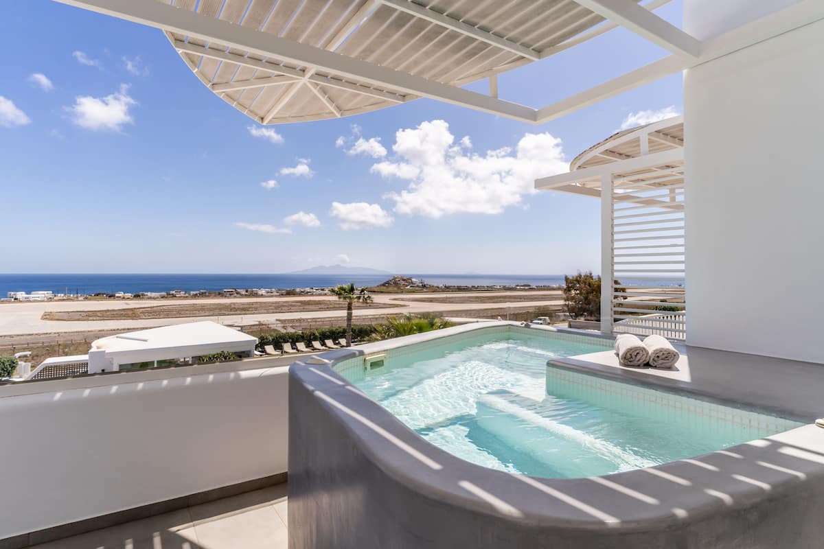 Executive Suite, Hot Tub, Sea View | Private spa tub