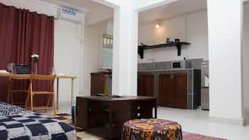 Double Room, 2 Bedrooms | Living room | Flat-screen TV