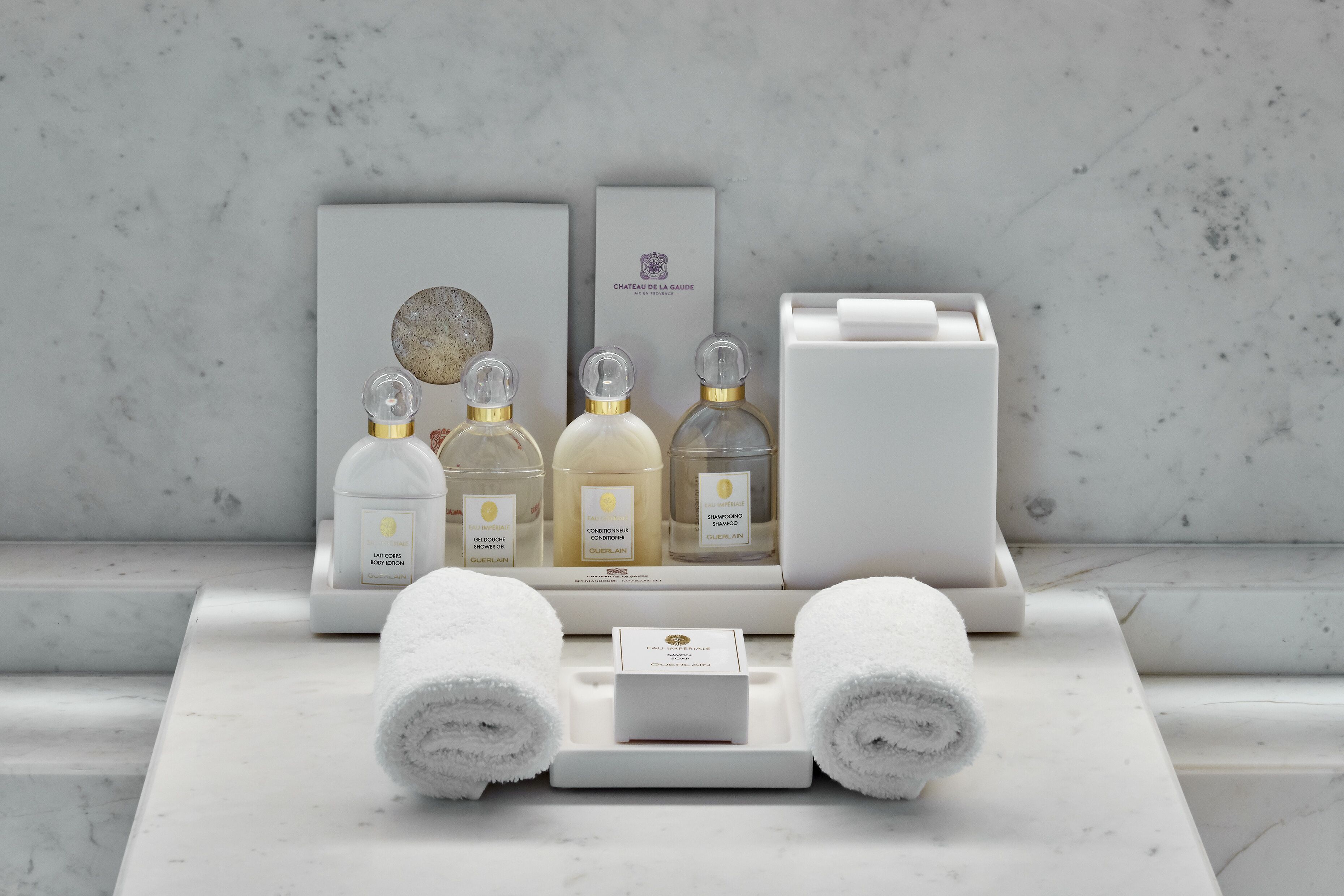 hair dryer, bathrobes, slippers, towels