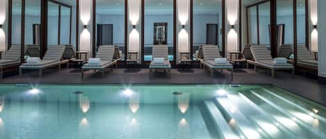 Indoor pool, open 7:00 AM to 10:00 PM, sun loungers