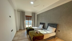 Apartment, 2 Bedrooms | 2 bedrooms, iron/ironing board (on request), free WiFi, bed sheets - Appart Happiness Sea View (Tangier)